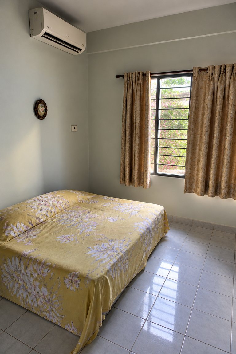 Aircon left running in an empty bedroom